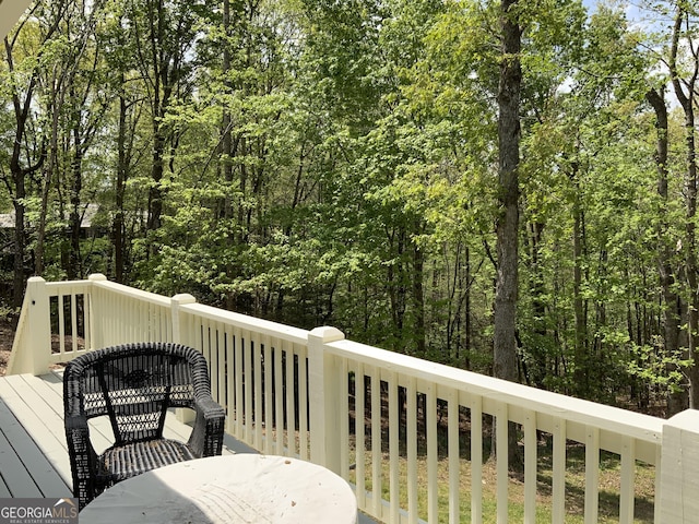 426 Shenendoa Dr, Ellijay, GA 30540 - wooden deck featuring a wooded view