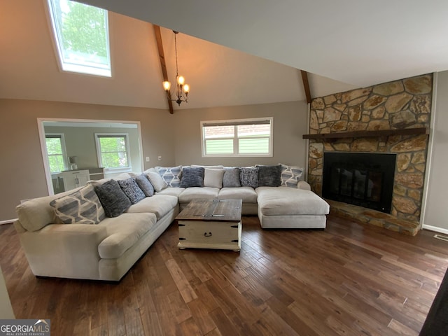 426 Shenendoa Dr, Ellijay, GA 30540 - living room with a chandelier, wood finished floors, a fireplace, and high vaulted ceiling