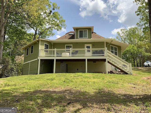 426 Shenendoa Dr, Ellijay, GA 30540 - back of house with a wooden deck, a lawn, stairway, and roof with shingles
