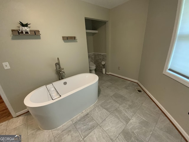 426 Shenendoa Dr, Ellijay, GA 30540 - bathroom with a freestanding tub and toilet