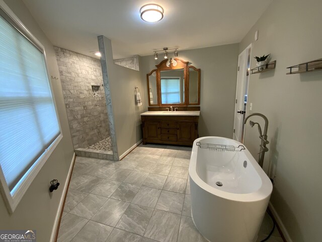 426 Shenendoa Dr, Ellijay, GA 30540 - full bathroom with vanity, a freestanding bath, walk in shower, and marble finish floors