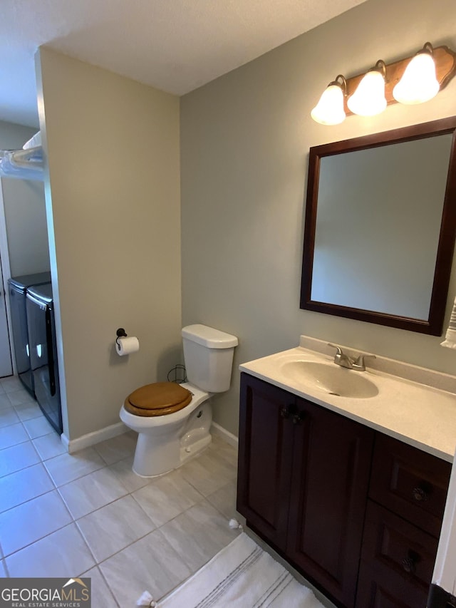 426 Shenendoa Dr, Ellijay, GA 30540 - full bathroom with independent washer and dryer, tile patterned flooring, and vanity