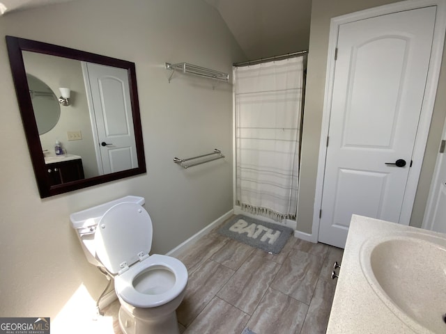 426 Shenendoa Dr, Ellijay, GA 30540 - bathroom with vanity, vaulted ceiling, and a shower with shower curtain