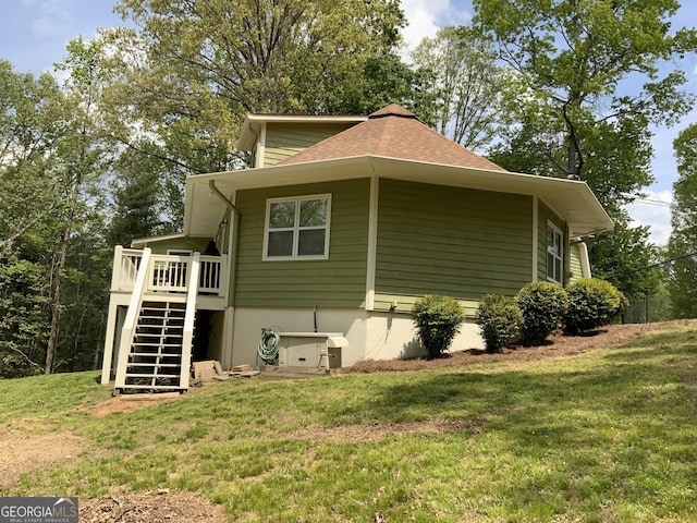 426 Shenendoa Dr, Ellijay, GA 30540 - view of property exterior with stairs, a lawn, a wooden deck, and roof with shingles
