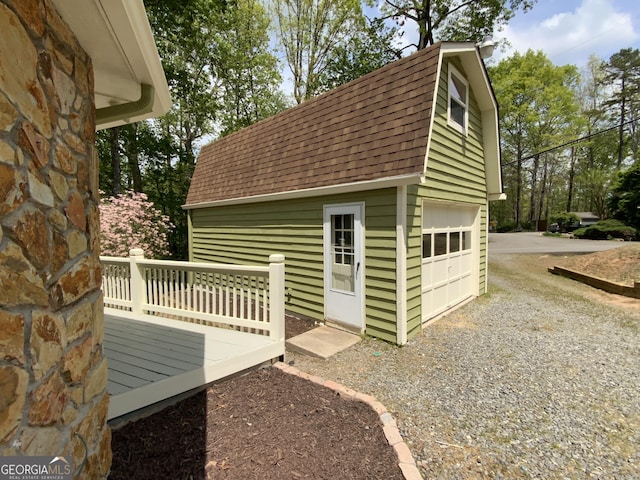 426 Shenendoa Dr, Ellijay, GA 30540 - view of outdoor structure with gravel driveway and a garage