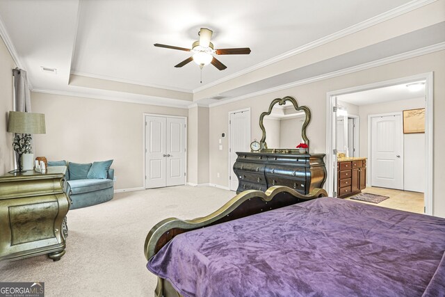 bedroom featuring a raised ceiling, visible vents, carpet floors, crown molding, and baseboards