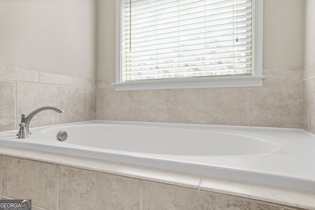 bathroom featuring a garden tub
