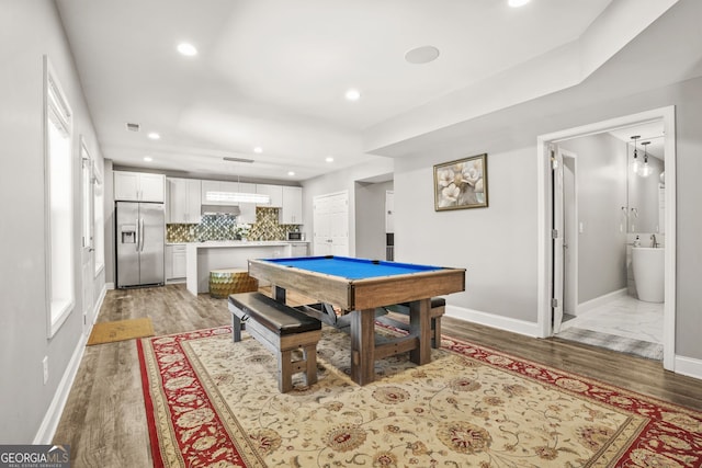 recreation room featuring light wood finished floors, baseboards, and billiards