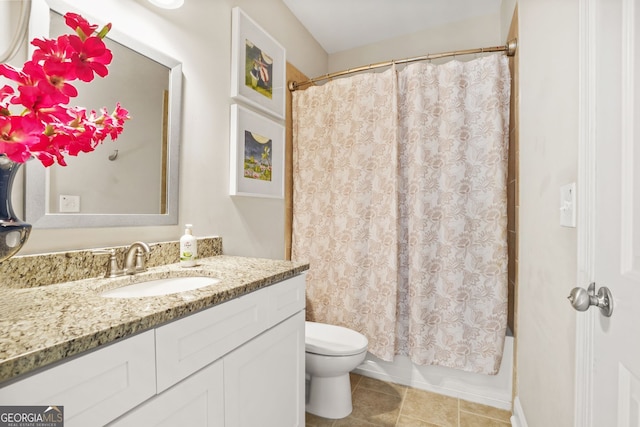 bathroom with tile patterned flooring, shower / bath combo with shower curtain, toilet, and vanity