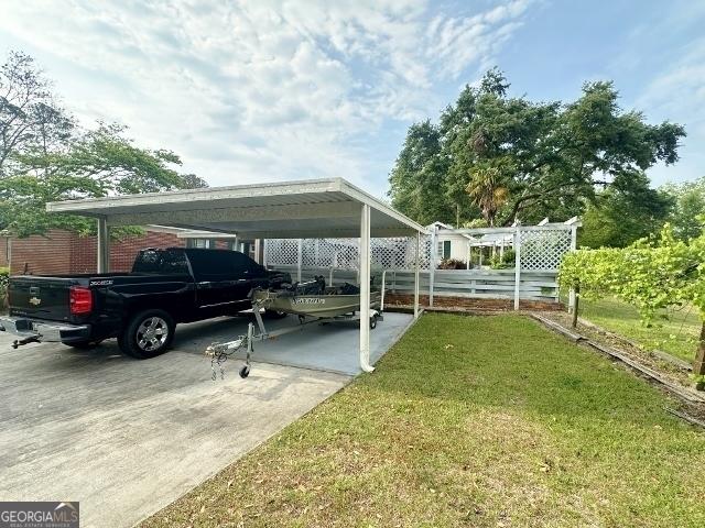 view of vehicle parking with driveway