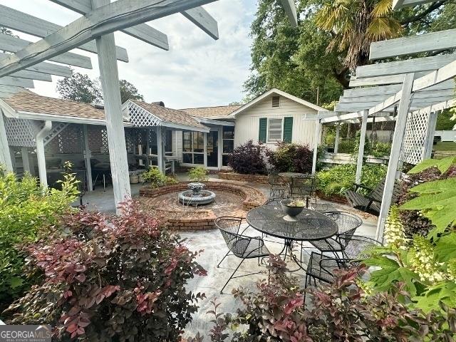 view of patio / terrace featuring a pergola