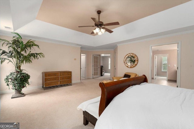 60 Heritage Keep, Covington, GA 30016 - bedroom featuring a raised ceiling, light colored carpet, crown molding, ensuite bathroom, and a ceiling fan