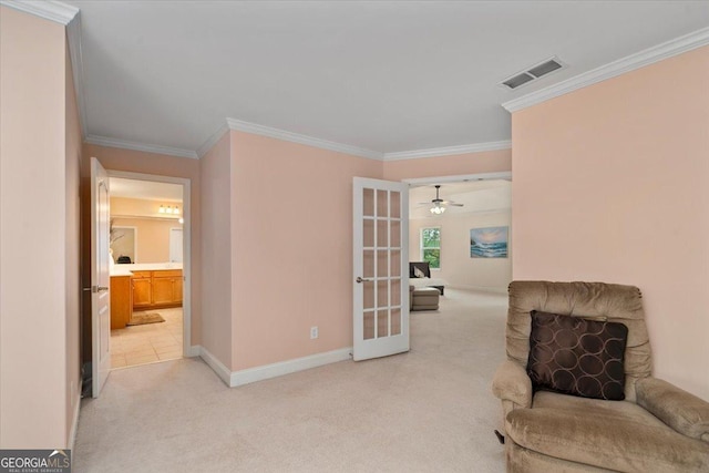 60 Heritage Keep, Covington, GA 30016 - living area featuring ornamental molding, light colored carpet, french doors, and a ceiling fan