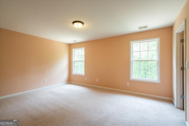 60 Heritage Keep, Covington, GA 30016 - empty room featuring light carpet