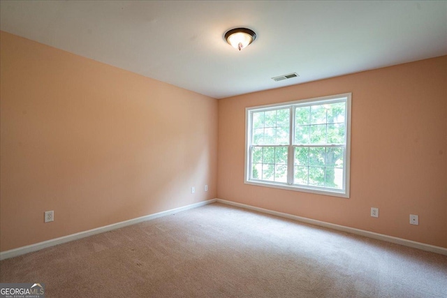 60 Heritage Keep, Covington, GA 30016 - carpeted empty room with baseboards