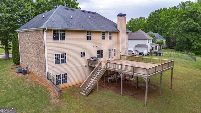 60 Heritage Keep, Covington, GA 30016 - back of property featuring a deck, a chimney, stairway, and roof with shingles