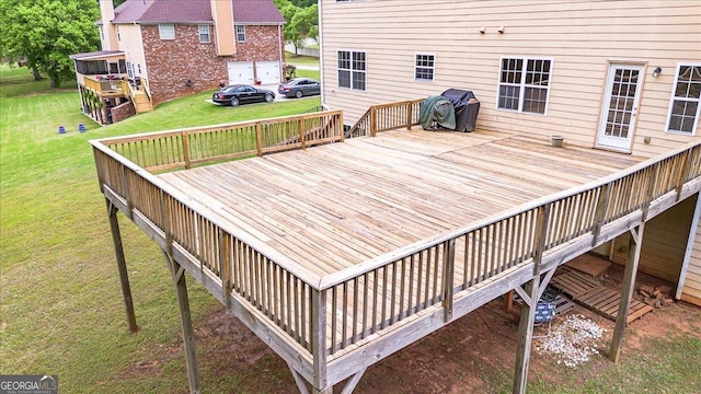 60 Heritage Keep, Covington, GA 30016 - wooden deck featuring a lawn, grilling area, and stairs