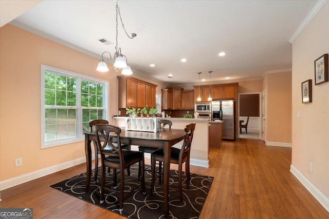 60 Heritage Keep, Covington, GA 30016 - dining room with crown molding, wood finished floors, and recessed lighting