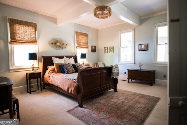 bedroom with carpet floors, multiple windows, crown molding, beam ceiling, and baseboards