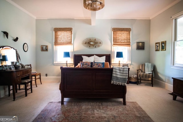 carpeted bedroom featuring ornamental molding and baseboards