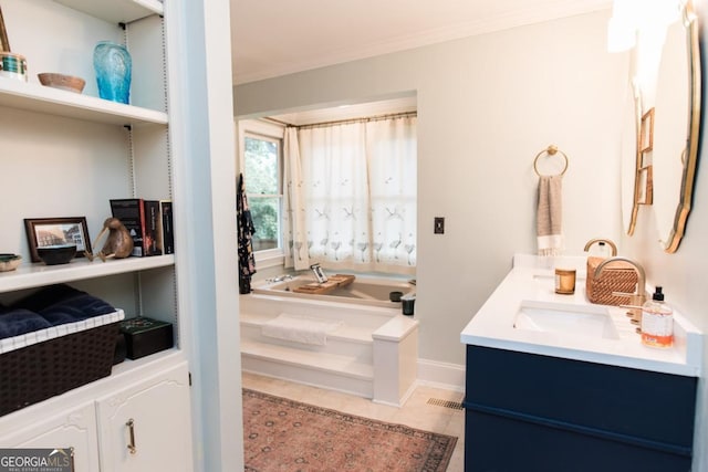 full bath with crown molding, a garden tub, tile patterned floors, double vanity, and baseboards
