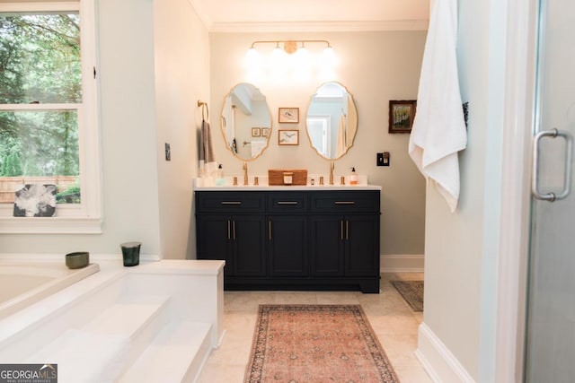 full bathroom with double vanity, baseboards, tile patterned floors, and a shower stall