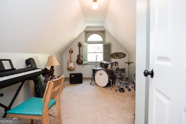 office area with carpet floors and lofted ceiling
