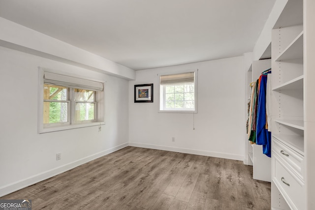 3990 Admiral Dr, Chamblee, GA 30341 - unfurnished bedroom featuring light wood-style flooring and baseboards