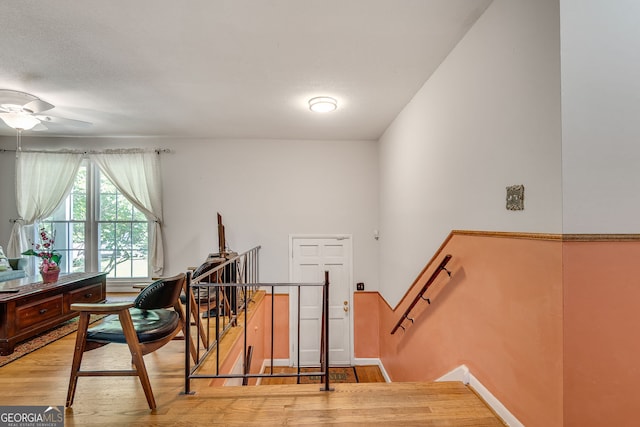 3990 Admiral Dr, Chamblee, GA 30341 - stairway with wood finished floors, baseboards, and ceiling fan