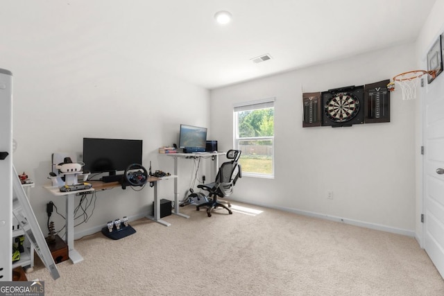 carpeted home office with baseboards and visible vents