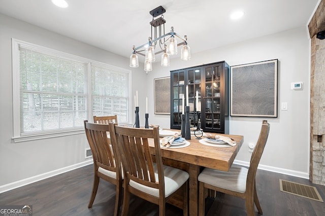 dining area with dark wood finished floors, baseboards, visible vents, and recessed lighting