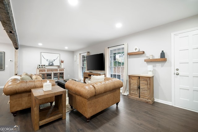 living room with recessed lighting, baseboards, and dark wood-style flooring