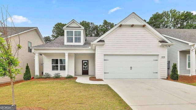 205 Farrell Creek Dr, Senoia, GA 30276 - view of front of property featuring an attached garage, roof with shingles, a front lawn, and driveway