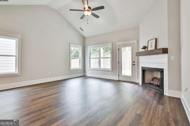 205 Farrell Creek Dr, Senoia, GA 30276 - unfurnished living room with a fireplace, dark wood-style floors, ceiling fan, and high vaulted ceiling