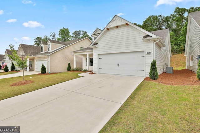 205 Farrell Creek Dr, Senoia, GA 30276 - view of front of property with an attached garage, concrete driveway, a front yard, and roof with shingles