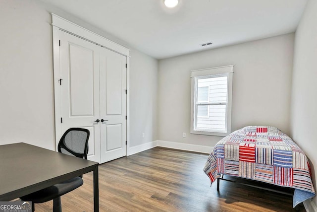 205 Farrell Creek Dr, Senoia, GA 30276 - bedroom featuring wood finished floors and a closet