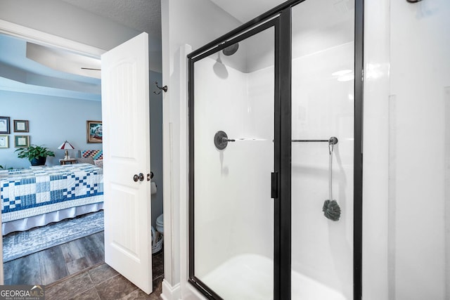 99 Mcmillian Ct, Winder, GA 30680 - ensuite bathroom featuring a shower stall, toilet, and ensuite bathroom