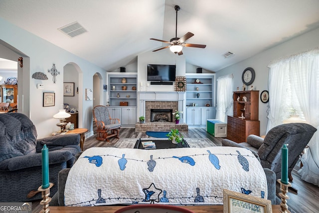 99 Mcmillian Ct, Winder, GA 30680 - bedroom with lofted ceiling, wood finished floors, and visible vents