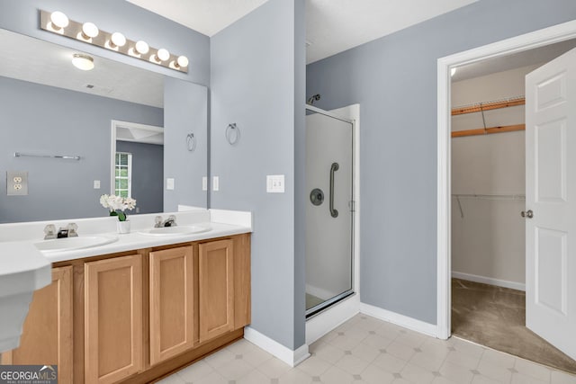 1220 Skipping Rock Ln SW, Grayson, GA 30017 - bathroom featuring double vanity, a sink, and a stall shower