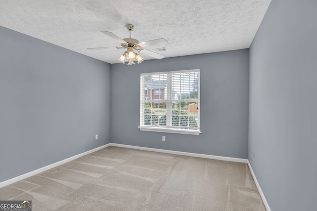 1220 Skipping Rock Ln SW, Grayson, GA 30017 - empty room with baseboards, carpet, a ceiling fan, and a textured ceiling