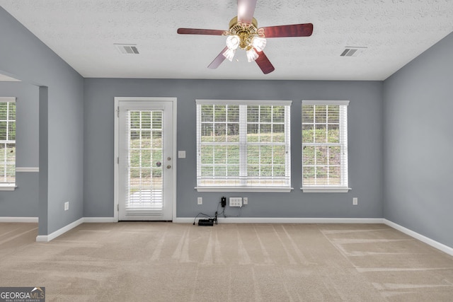 1220 Skipping Rock Ln SW, Grayson, GA 30017 - interior space with visible vents, a ceiling fan, baseboards, and carpet floors