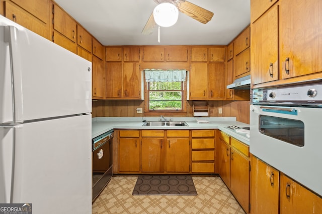 470 Hunnicutt Rd SE, Mableton, GA 30126 - kitchen with light countertops, under cabinet range hood, a sink, and white appliances