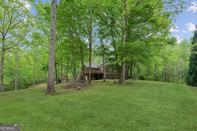 4761 Gateway Ln, Flowery Branch, GA 30542 - view of grassy yard with a deck and stairway