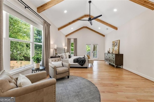 2553 Creekwood Ter, Decatur, GA 30030 - bedroom featuring beam ceiling, light wood-type flooring, access to outside, baseboards, and high vaulted ceiling