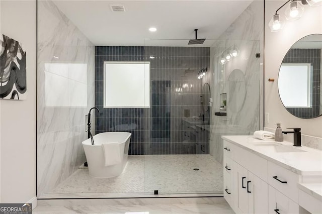 2553 Creekwood Ter, Decatur, GA 30030 - full bathroom featuring vanity, a tile shower, marble finish floors, a freestanding tub, and tile walls