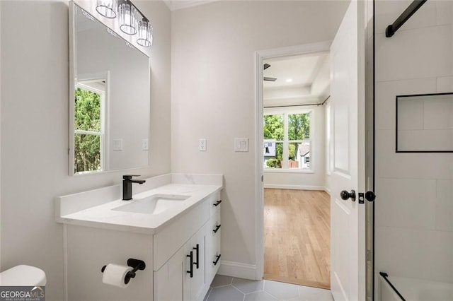 2553 Creekwood Ter, Decatur, GA 30030 - bathroom with vanity, toilet, and baseboards