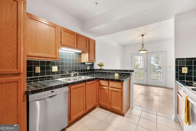 406 Vinings Forest Cir SE, Smyrna, GA 30080 - kitchen featuring a sink, tile countertops, decorative backsplash, dishwasher, and french doors