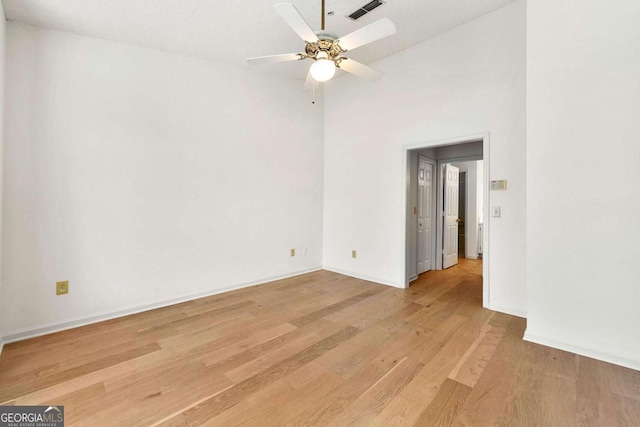 406 Vinings Forest Cir SE, Smyrna, GA 30080 - unfurnished room featuring baseboards, a ceiling fan, visible vents, and light wood-style floors