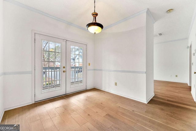 406 Vinings Forest Cir SE, Smyrna, GA 30080 - interior space featuring french doors, visible vents, baseboards, crown molding, and wood-type flooring
