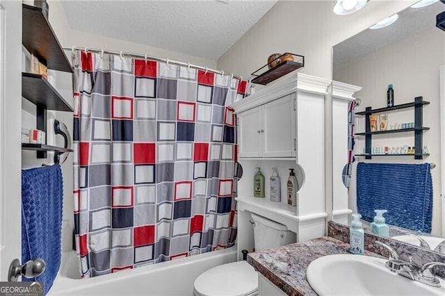 12 Mulberry Rd, Winder, GA 30680 - bathroom featuring vanity, shower / tub combo with curtain, and a textured ceiling